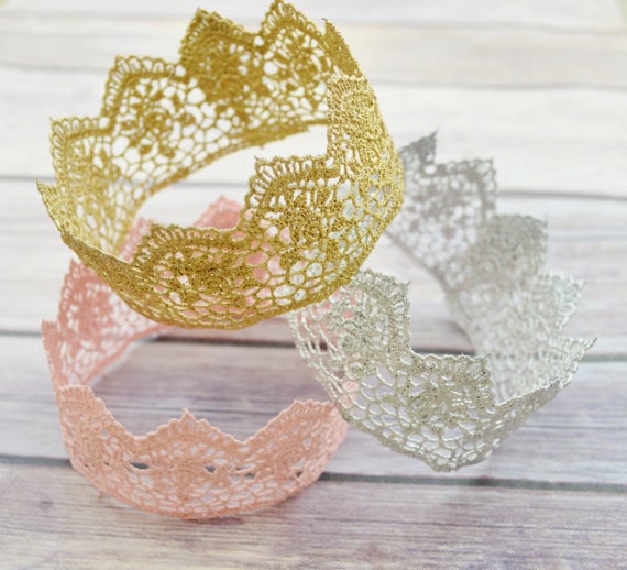 Pretty lace crowns, gold, white, and pink ones shown. 