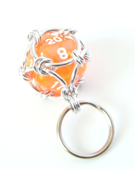 orange and silver D20 keychain for gamers