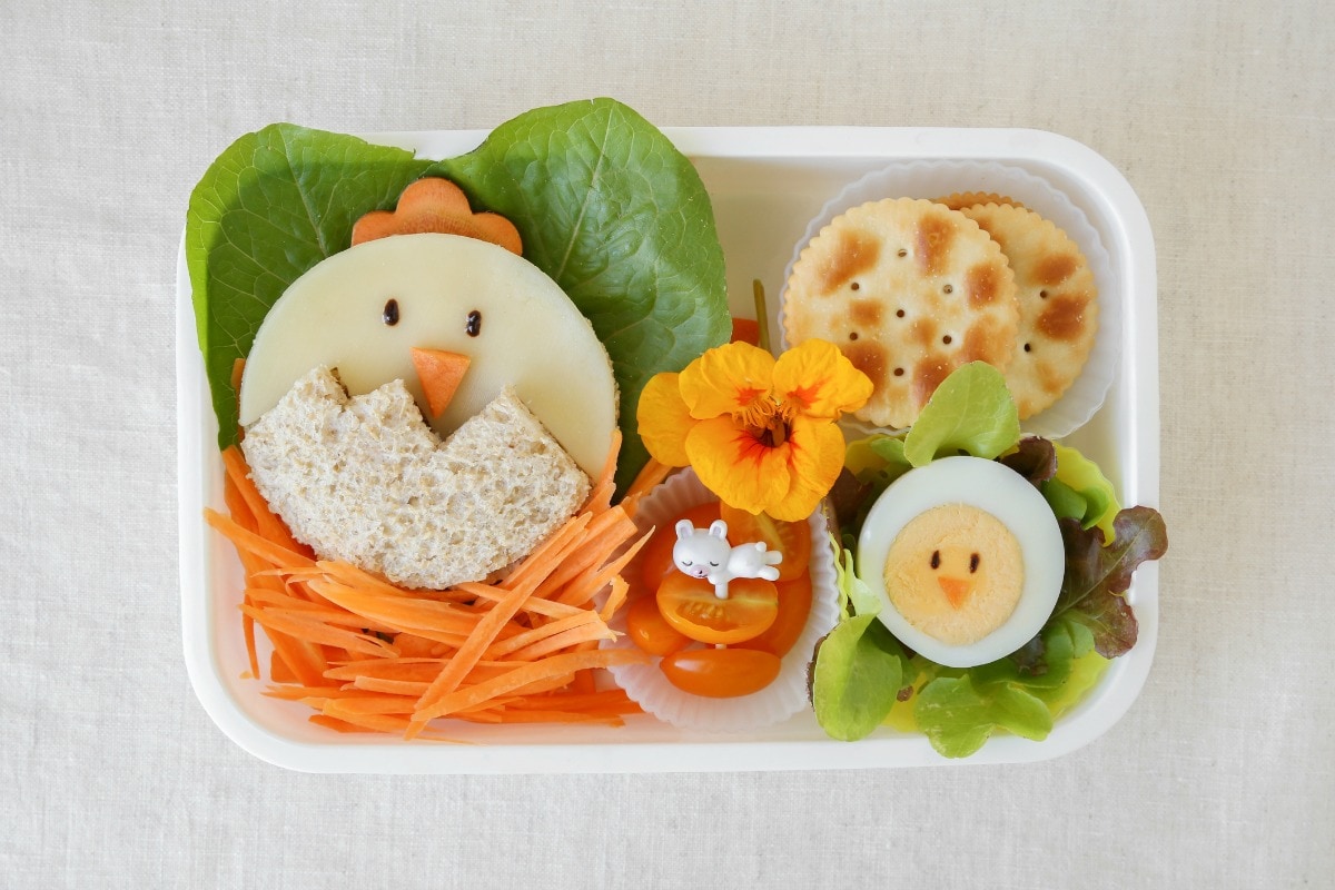 A lunch Box for children with Chicken. A lunch Box for children with Eggs and Chicken.