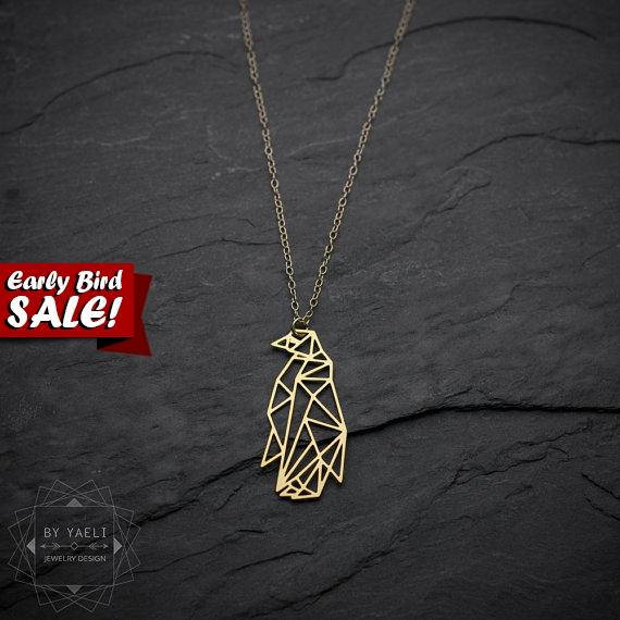 Gold geometric penguin necklace