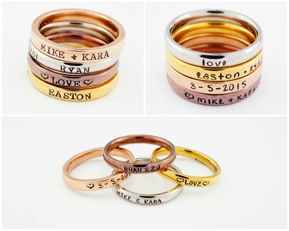 mothers rings showing kids names and birthdates on them. 