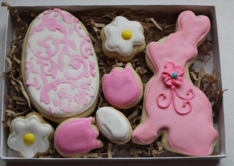 Easter Gifts for Friends: Box of Easter cookies, white egg with pink designs, pink bunny, pink tulips and white daisy's cookies. 