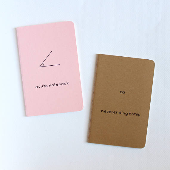 light pink and brown math notebooks. 