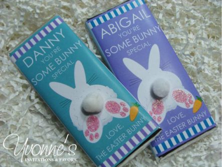 Two Easter chocolate bars with customizable print on them and a bunny bum with a white pom pom as a tail. 