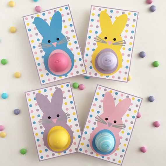 Easter Classroom Gifts for 8th Grade Students: Printable cards shown each with a bunny and a round lip balm placed on their tummy. Blue bunny, yellow bunny, purple bunny and a pink bunny shown. 