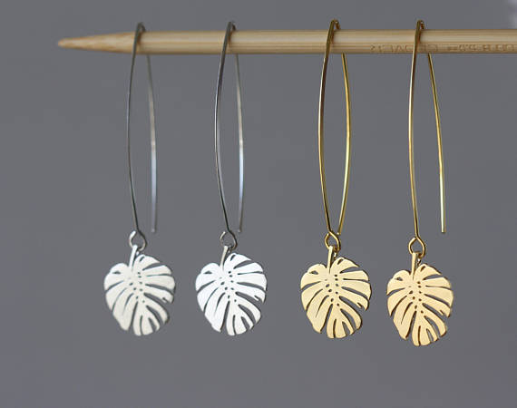 Mother's day gifts for sister-in-laws include beautiful ones like this. Silver palm leave earring and gold. 