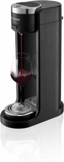 Black wine dispenser with a wine glasses being filled with red wine. 