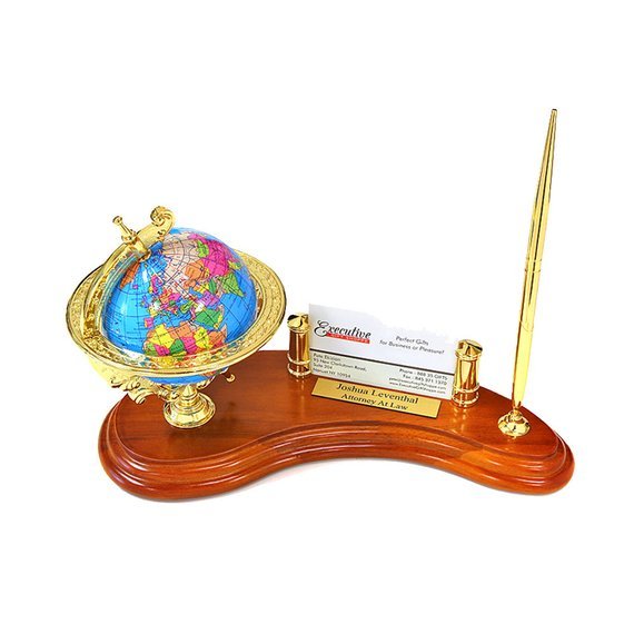 Luxury pen stand,  wooden base with a gold, gold business card space and a golden pen. 