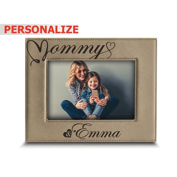 Grey leathered style photo frame with black font that says Mommy & Emma and a photo of a mom and a young girl. 