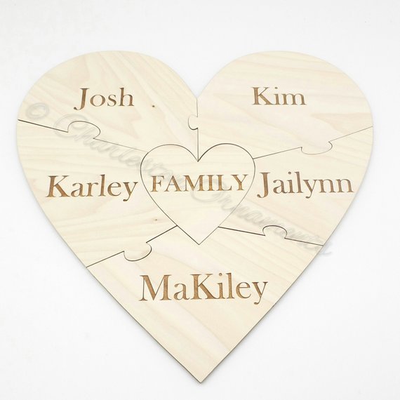 Father’s Day Gifts For Hard to Buy For Dads - Wooden heart shaped puzzle, each piece with a different family member name on it. 