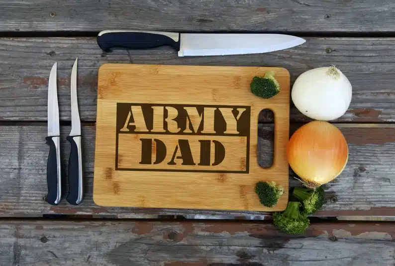 Wood cutting board that says Army dad. 