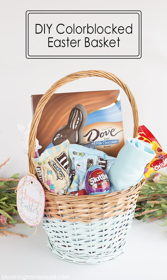 Wicker style Easter basket half light blue and half regular colors, Filled with various Easter candy and chocolates. 