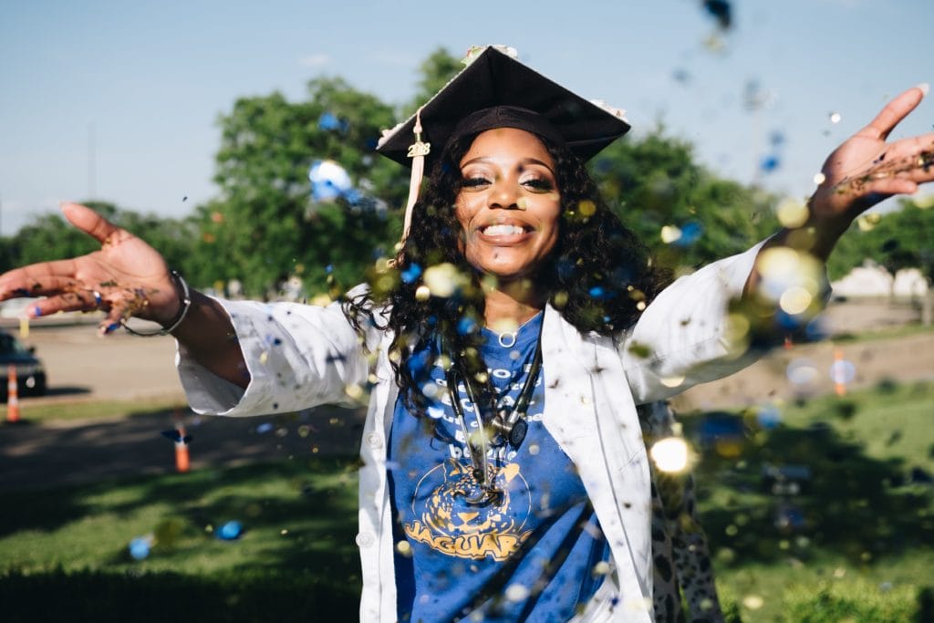 Female graduate celebrating