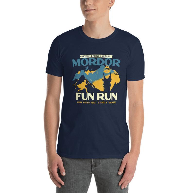 Man wearing a navy blue t-shirt that says Mordor fun run.