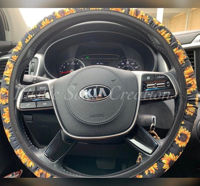 Neoprene Steering Wheel Cover with sunflowers all over it. 