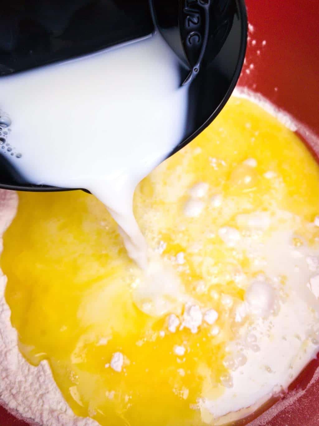 Adding milk to melted butter