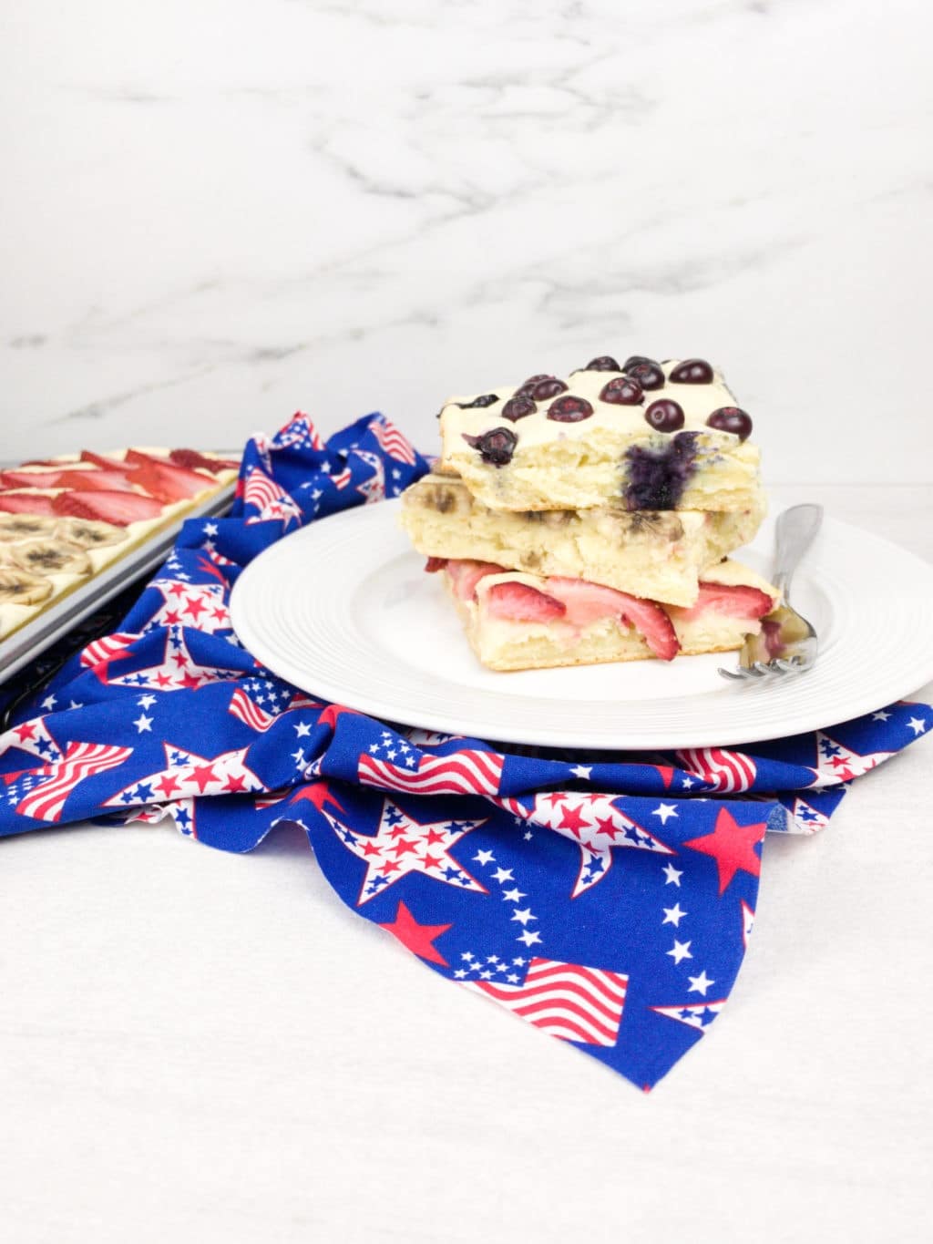 Delicious looking 4th of July sheet pan pancakes with fruit