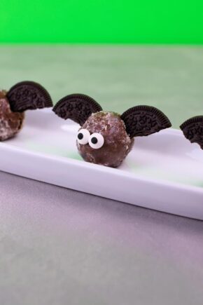 bat donut holes with candy eyes and oreo wings