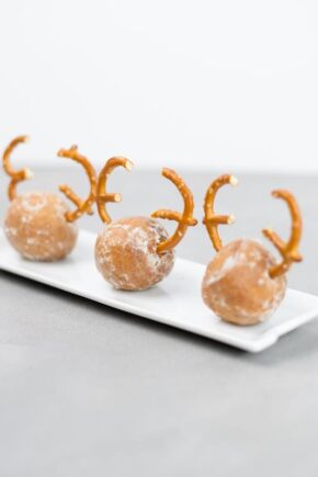 Donut holes with pretzel antlers