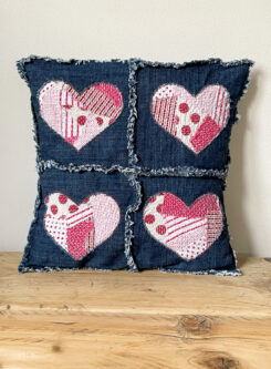 denim pillow with upcycled hearts 