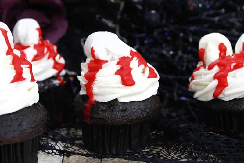 Halloween themed cupcakes baking idea on a black lattice decoration background