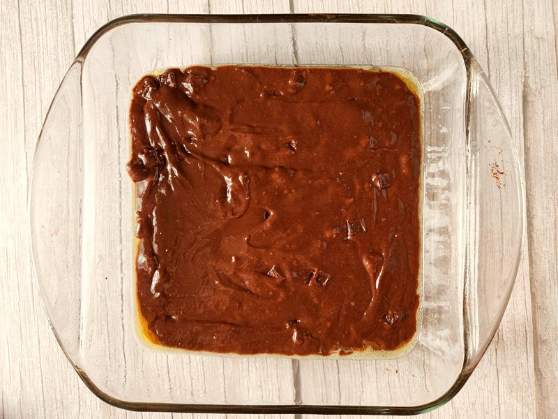 baking tray filled with brownie mix to be baked in the oven