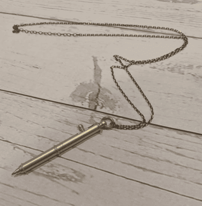 Gold pen artist necklace