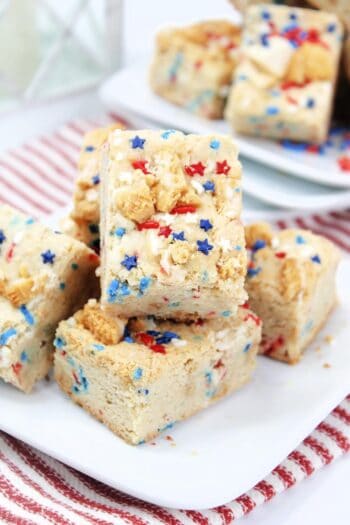 Close up of plated Oreo brownies showing crushed up Oreos and patriotic Sprinkles. 