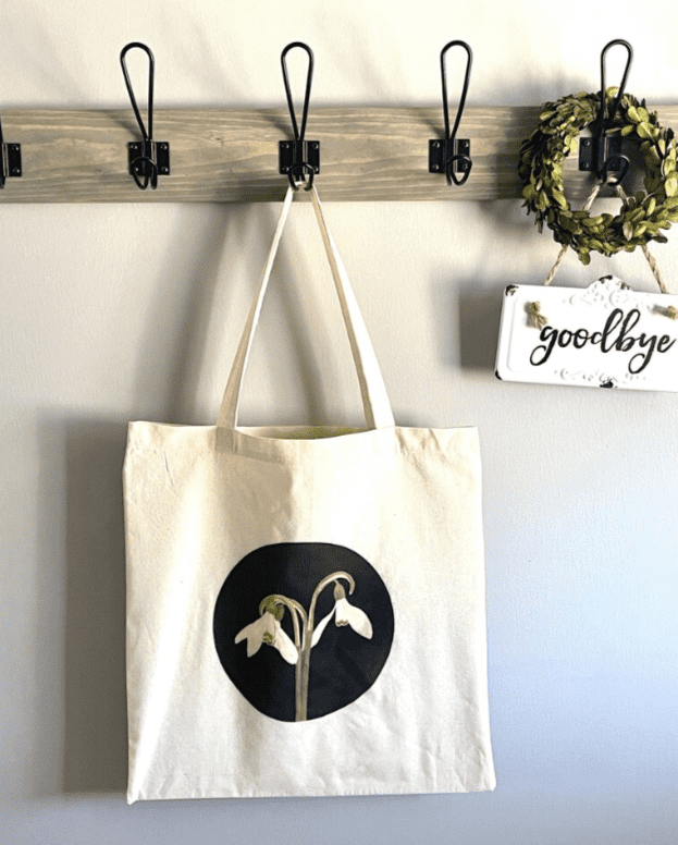 Cotton tote bag with a snowdrop flower on it