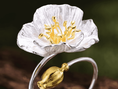 Ring with a poppy flower on the top for a June birthday gift