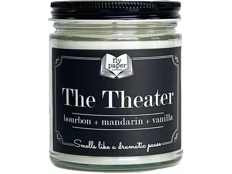 Candle that smells like the theatre with bourbon, mandarin, and vanilla scents