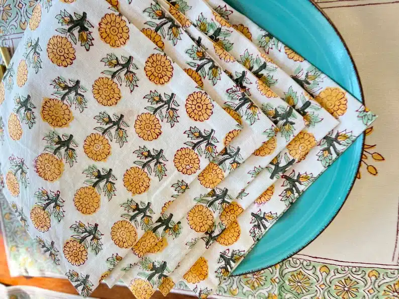 Marigold print vintage style napkin set for an October birthday