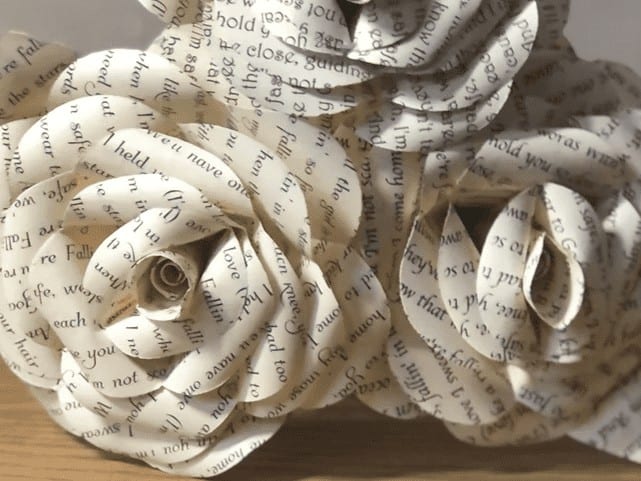 Paper roses made from song lyric sheets