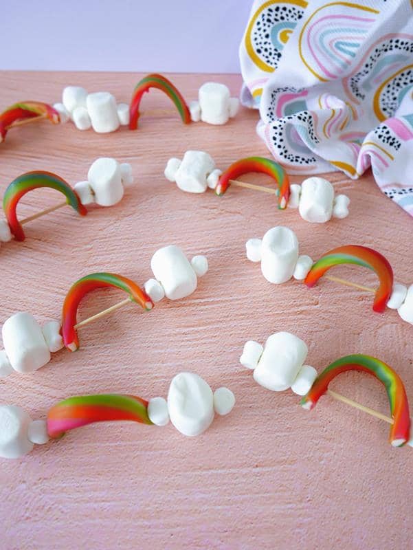 above view of 8 completed Rainbow Skewer snacks. 