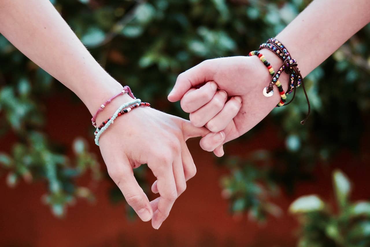 Blessingway bead bracelets for a feminist baby shower game