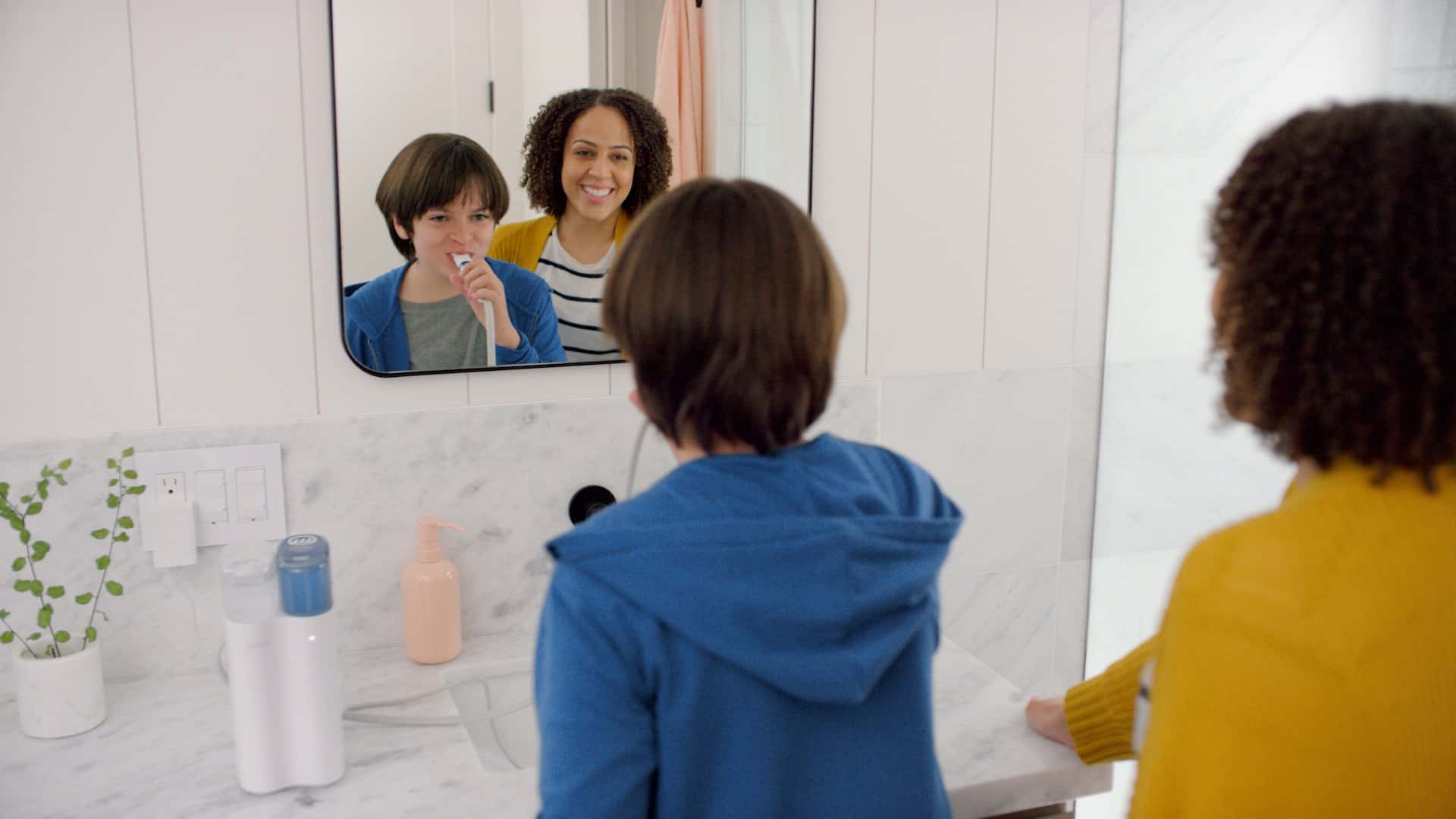 Kid brushing his teeth