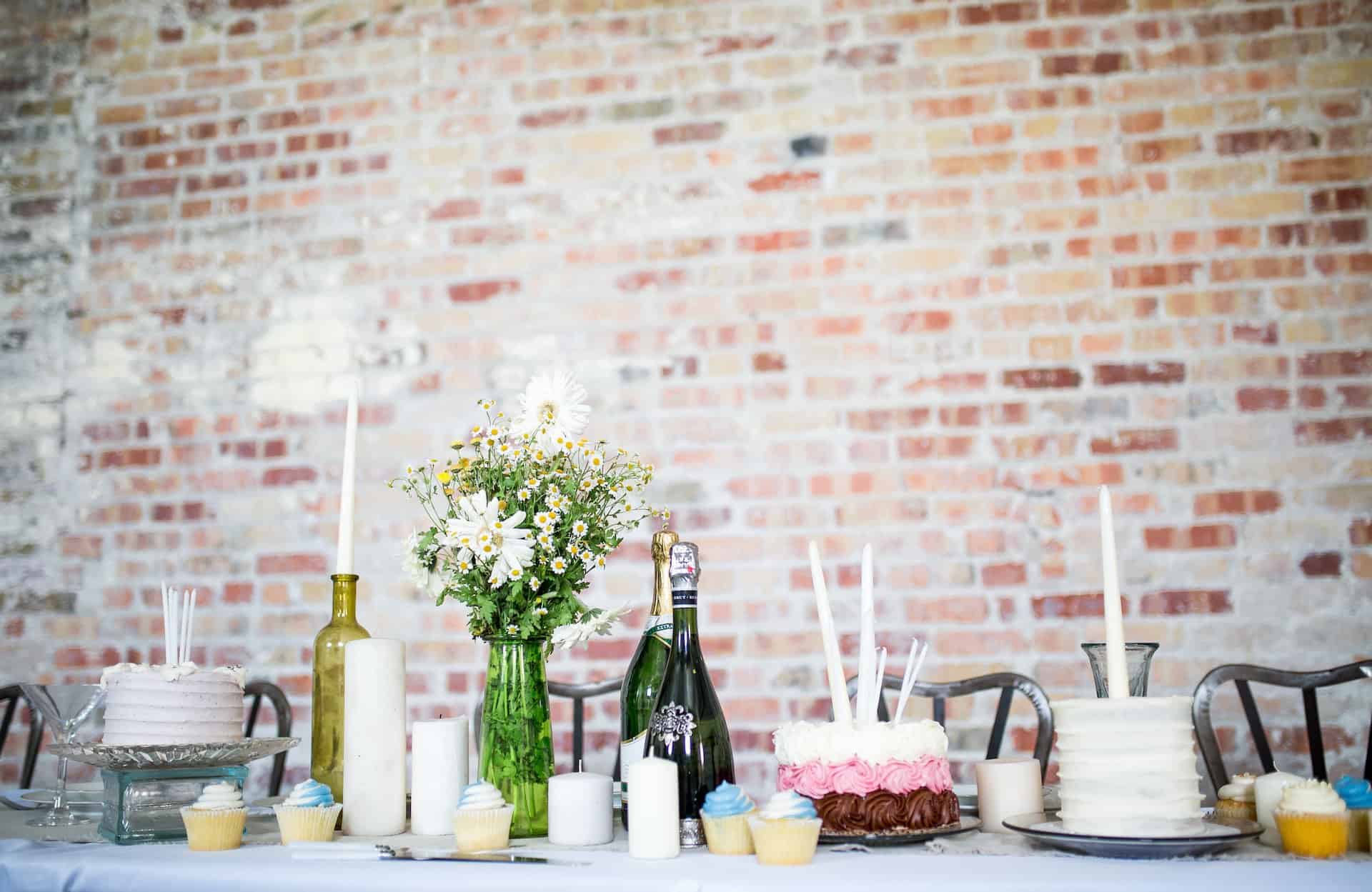 Graduation party set up with a table, cake, and other decorations