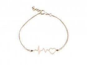Solid gold necklace with a heart beat sign with a heart on it.