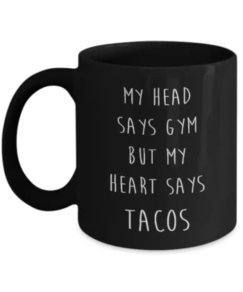 Mug that says my  head says gym but my heart says tacos