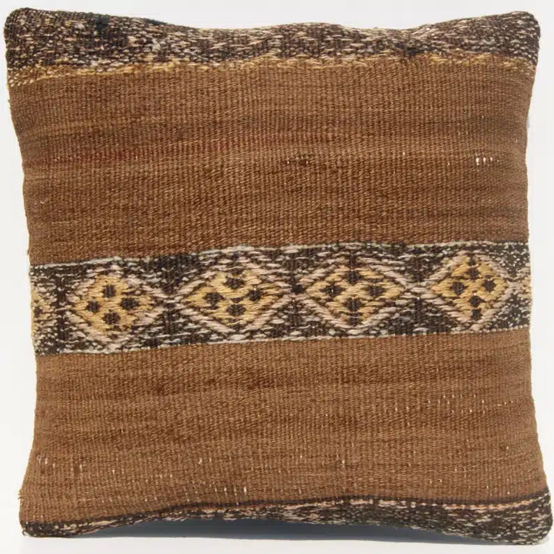 Brown square throw pillow. 