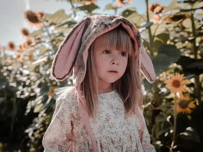 little girl wearing a homemade bunny hat. 