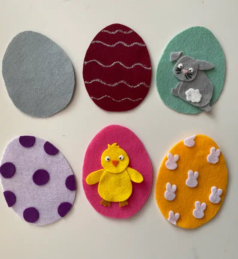 six different felt eggs shown all different colored with different patterns. 