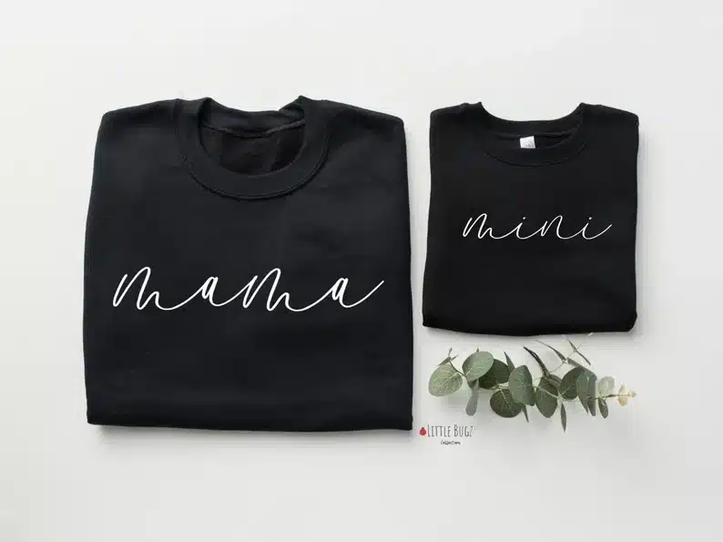 Mother's Day Gifts From Toddlers: Two black t-shirts, one for an adult and one for a toddler. Both with white font one saying mama and the other mini. 