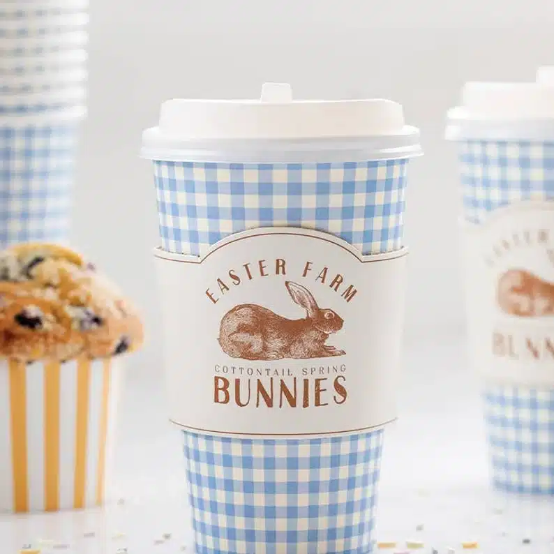 Bunny coffee cups, blue and white background on coffee cups with a brown bunny label. 