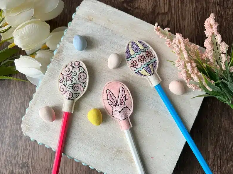 Easter Classroom Gifts for 4th Grade Students: Three felt Easter egg pencil toppers. 