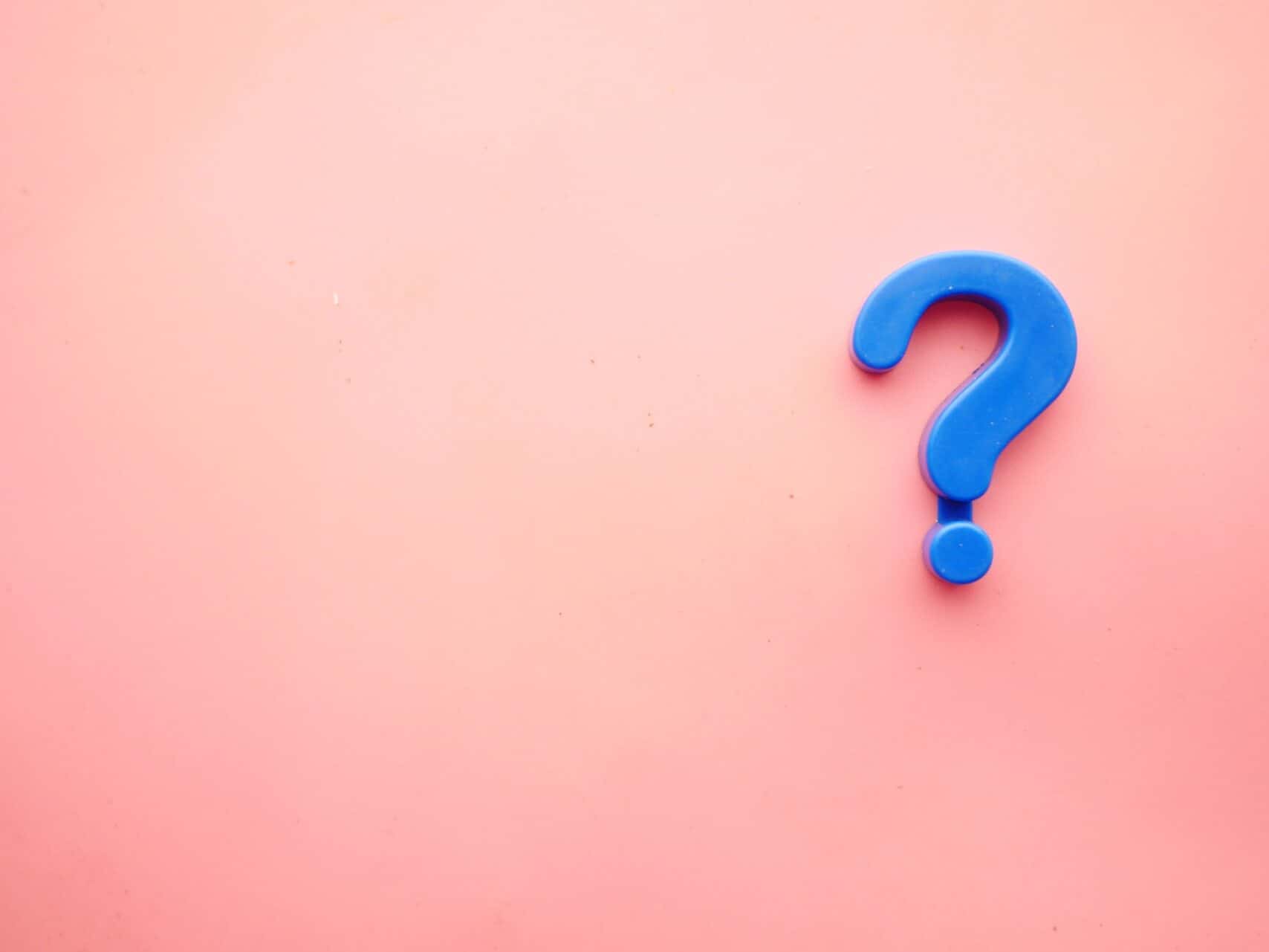 Question mark on a pink background