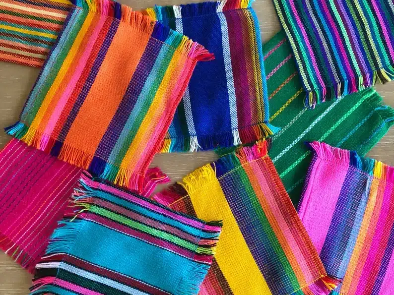 Many different Mexican napkins shown. 