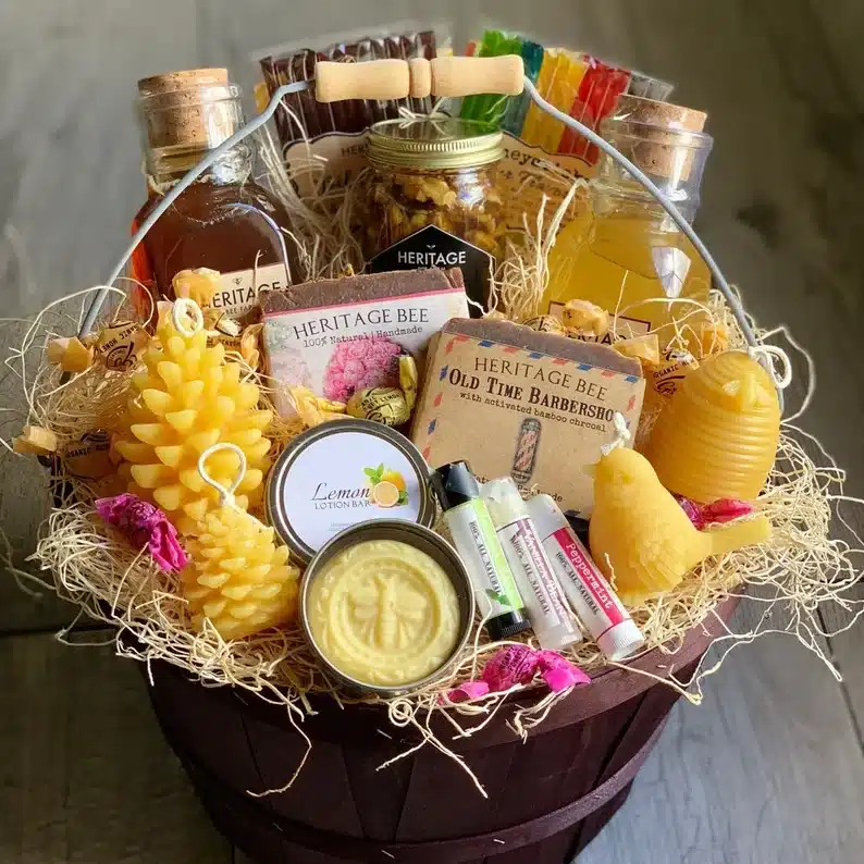 Wooden basket with bee farm gifts, bee wax lip car, honey, soaps, and more. 
