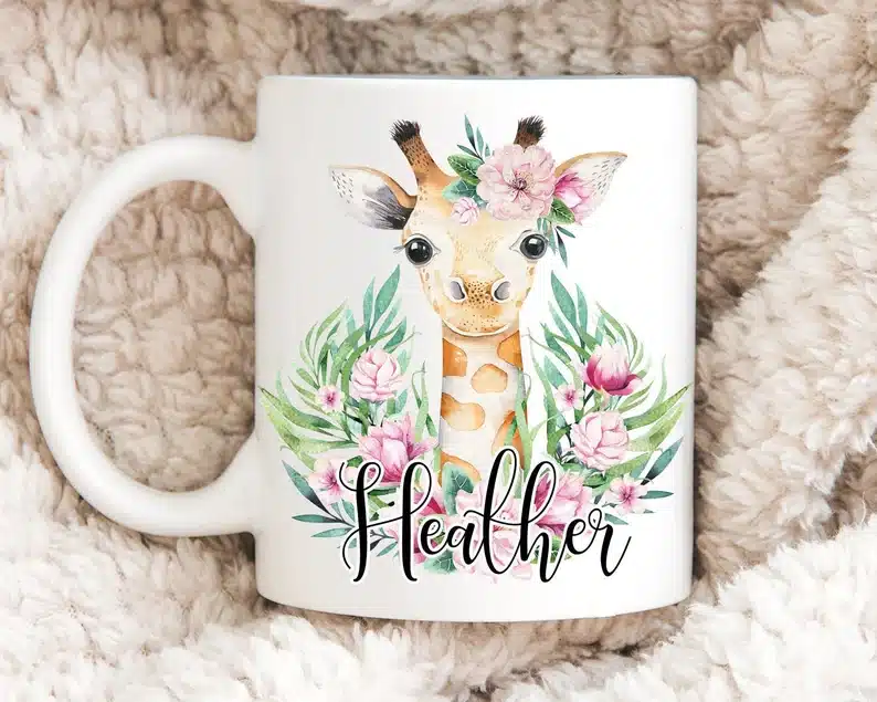 Gift Ideas for Giraffe Lovers: white coffee mug with a giraffe with flowers on it. 