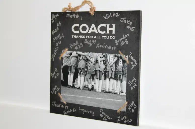 Best Soccer Coach Gifts: Black frame that says Coach thanks for all you do. with signatures all around it. 